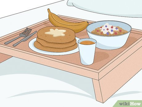 Serve him a delicious breakfast or brunch in bed.